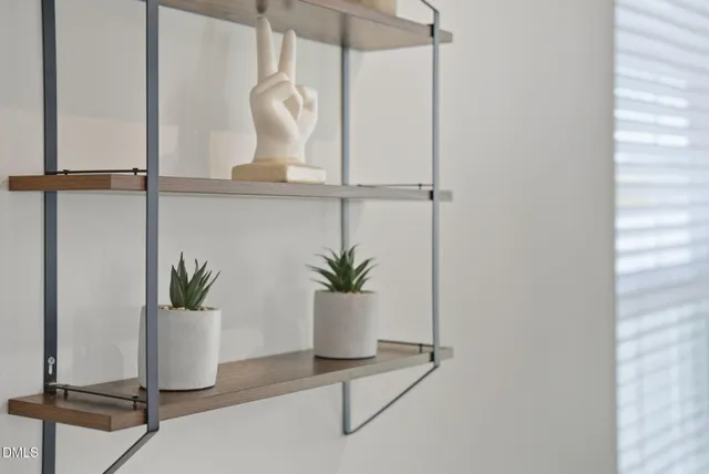 a bathroom with a shower a toilet and a sink
