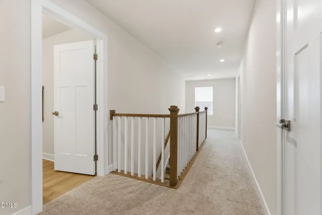 a bedroom with a bed and a television