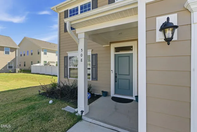 a view of a livingroom with furniture and wooden floor