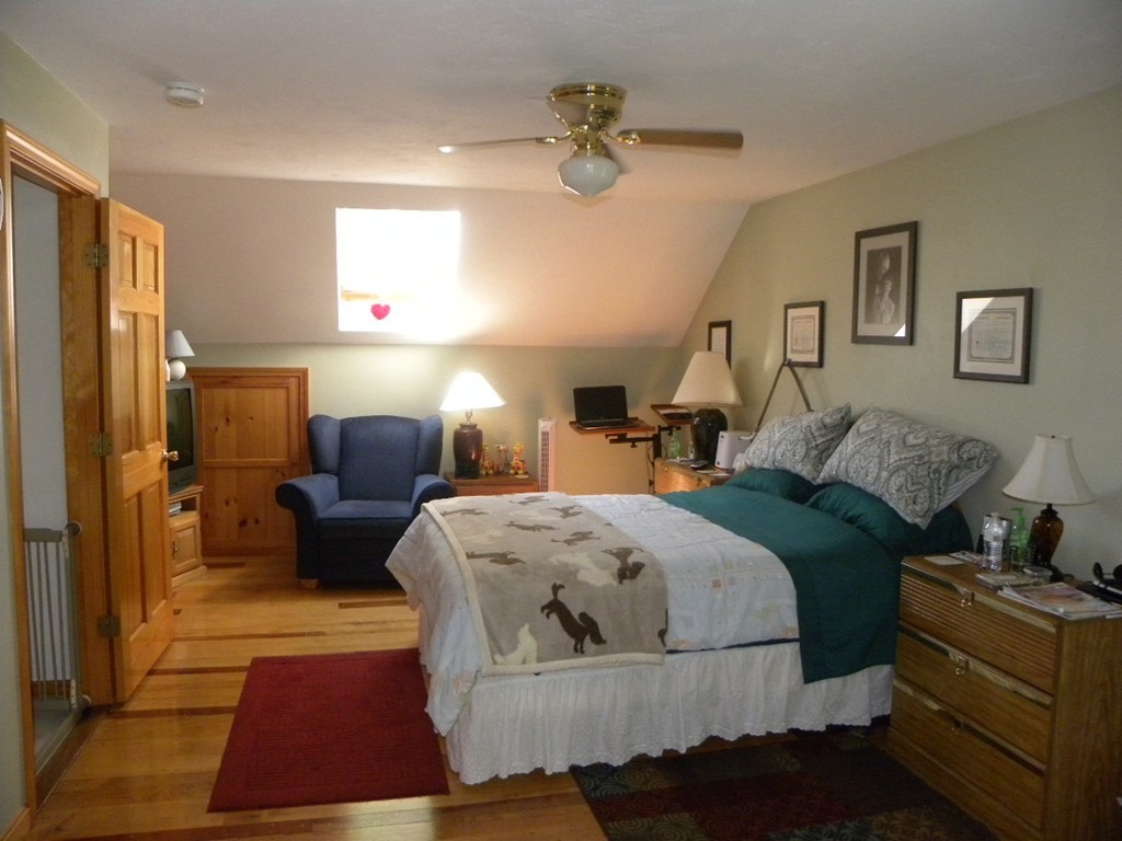 290 North Sturbridge Road Charlton, MA 01507 - Photo 12 of 30 a living room with bed furniture and a window