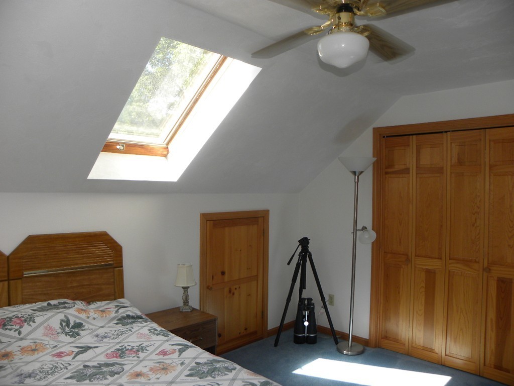 290 North Sturbridge Road Charlton, MA 01507 - Photo 16 of 30 a bedroom with a bed and a window