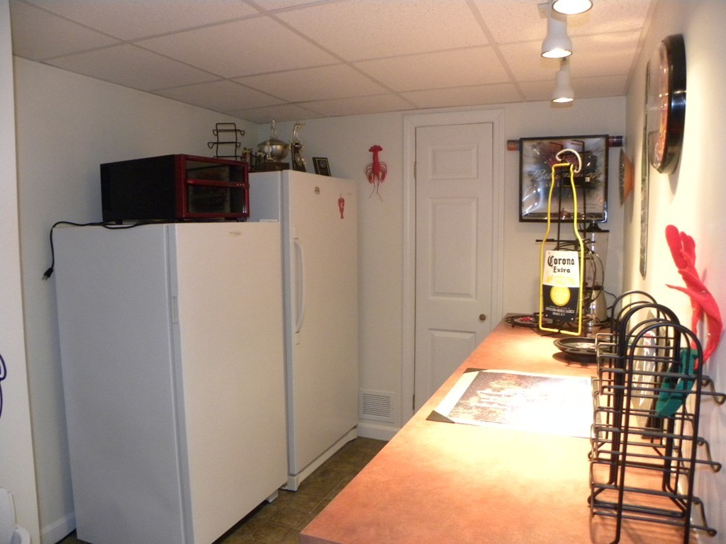 290 North Sturbridge Road Charlton, MA 01507 - Photo 27 of 30 a view of a livingroom with furniture and storage