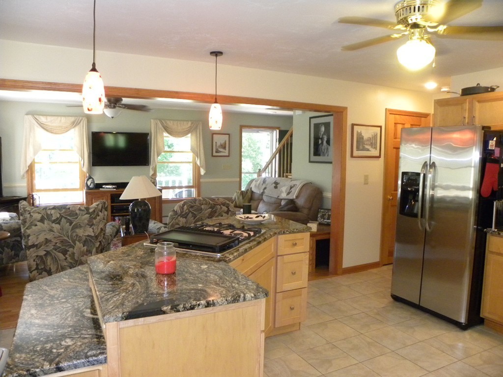 290 North Sturbridge Road Charlton, MA 01507 - Photo 3 of 30 a kitchen with stainless steel appliances granite countertop a sink a stove and a refrigerator