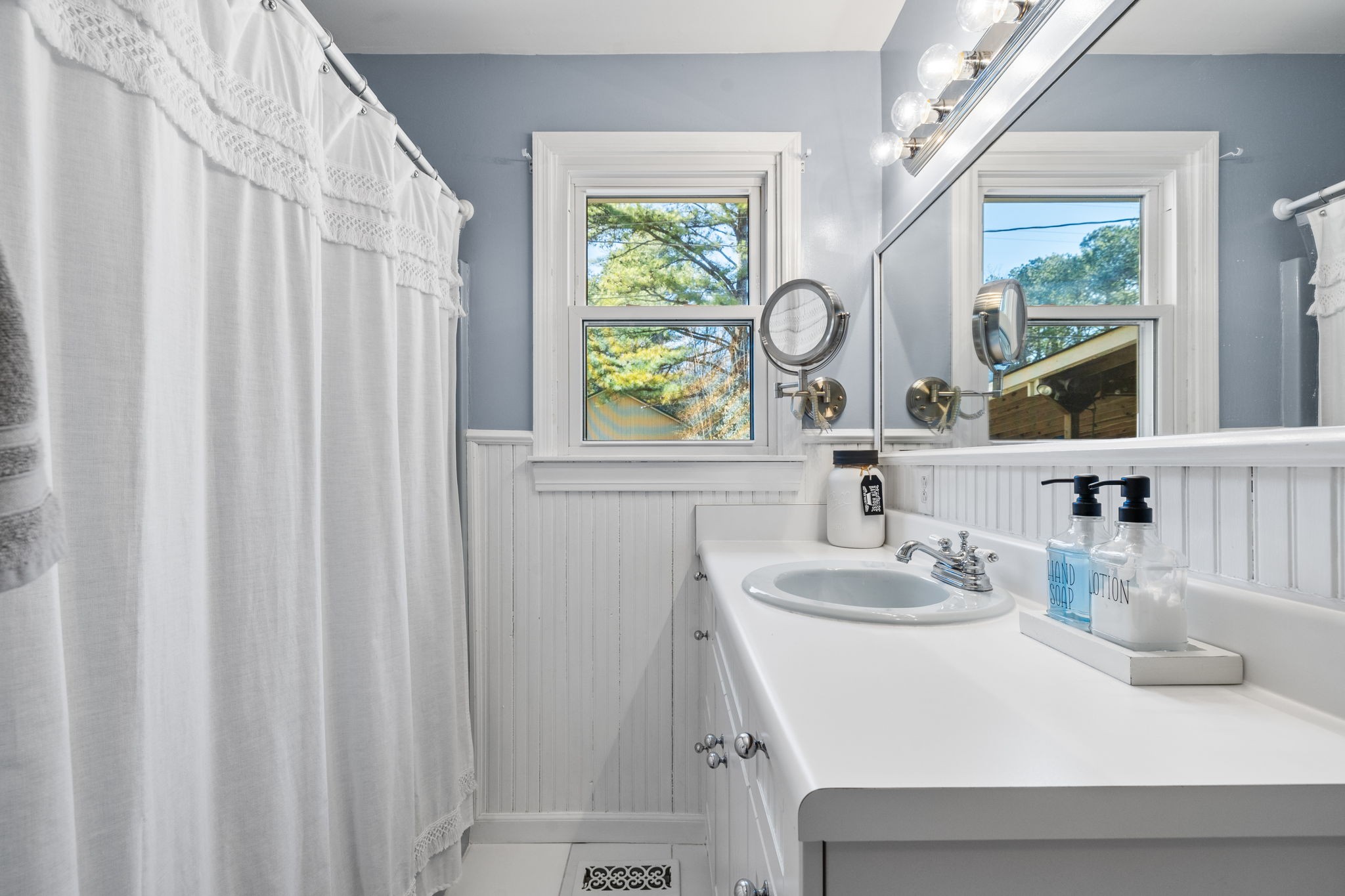 4431 Peytonsville-Trinity Road Franklin, TN 37064 - Photo 28 of 52 a bathroom with a sink and a mirror
