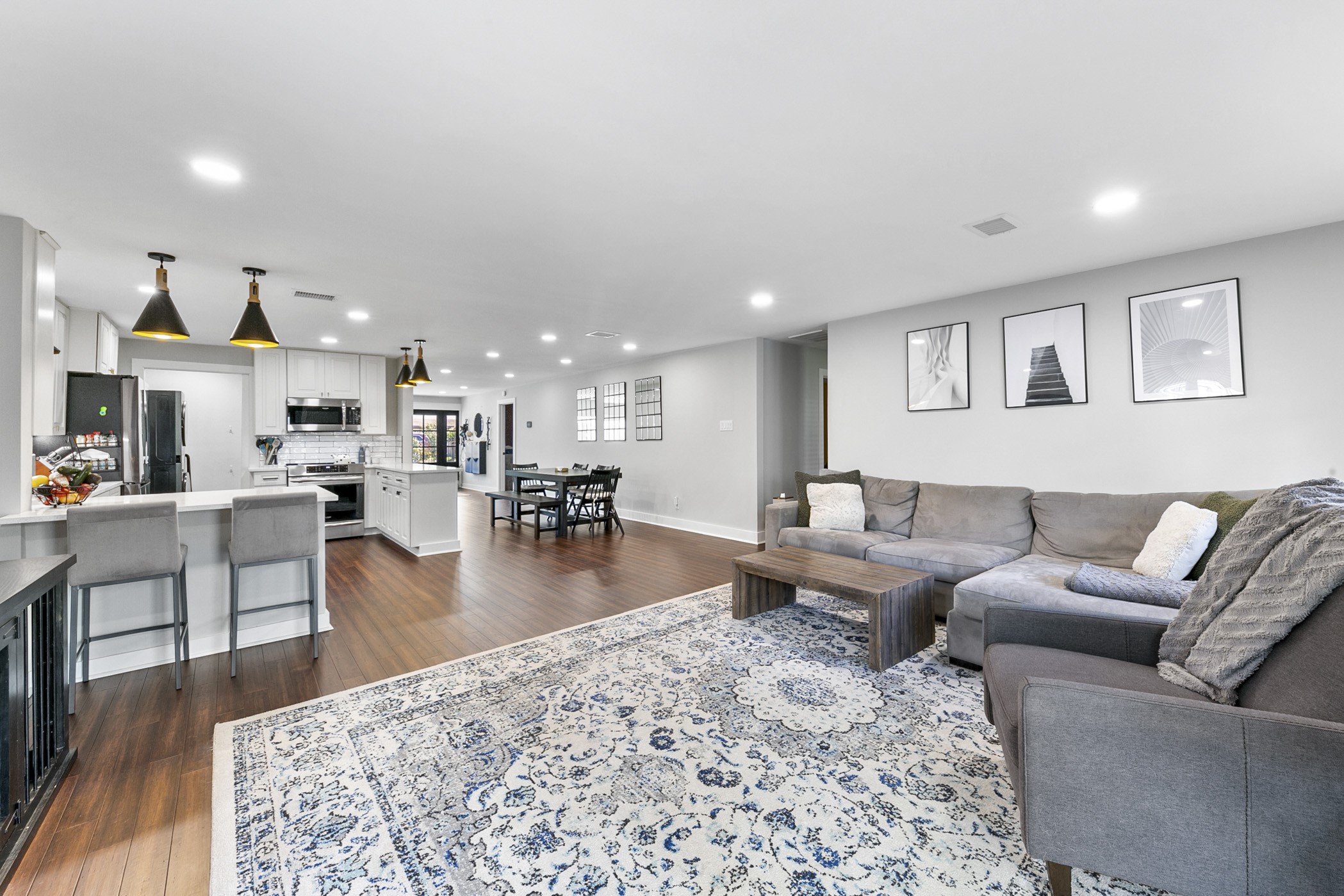 1609 Tabor Street Houston, TX 77009 - Photo 19 of 36 The open living room features a seamless layout, perfect for effortless flow and maximizing natural light throughout the space.
