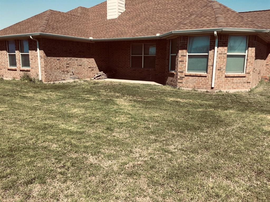 306 Packer Drive Fate, TX 75189 - Photo 15 of 15 a front view of a house with a yard