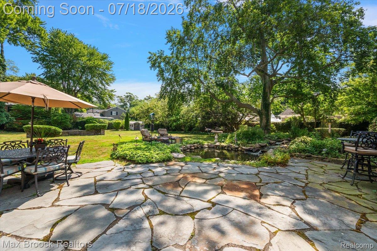294 Lincoln Road Grosse Pointe, MI 48230 - Photo 60 of 84 Back patio with views of waterfall and pond