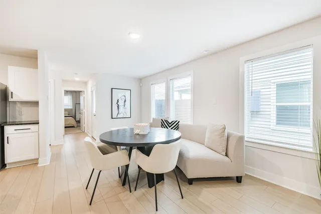 a living room with furniture and a table