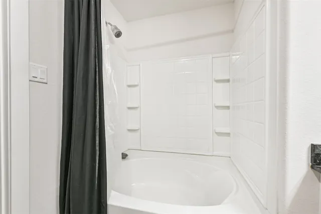 a bathroom with a bathtub