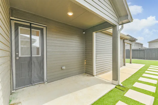 a view of backyard with cabin