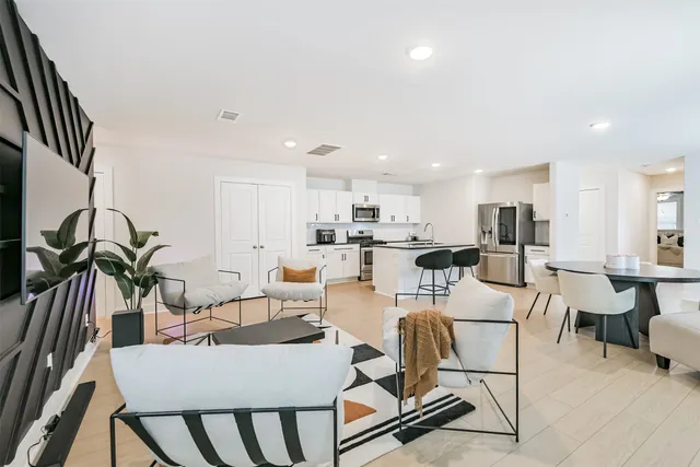 a view of a dining room with furniture