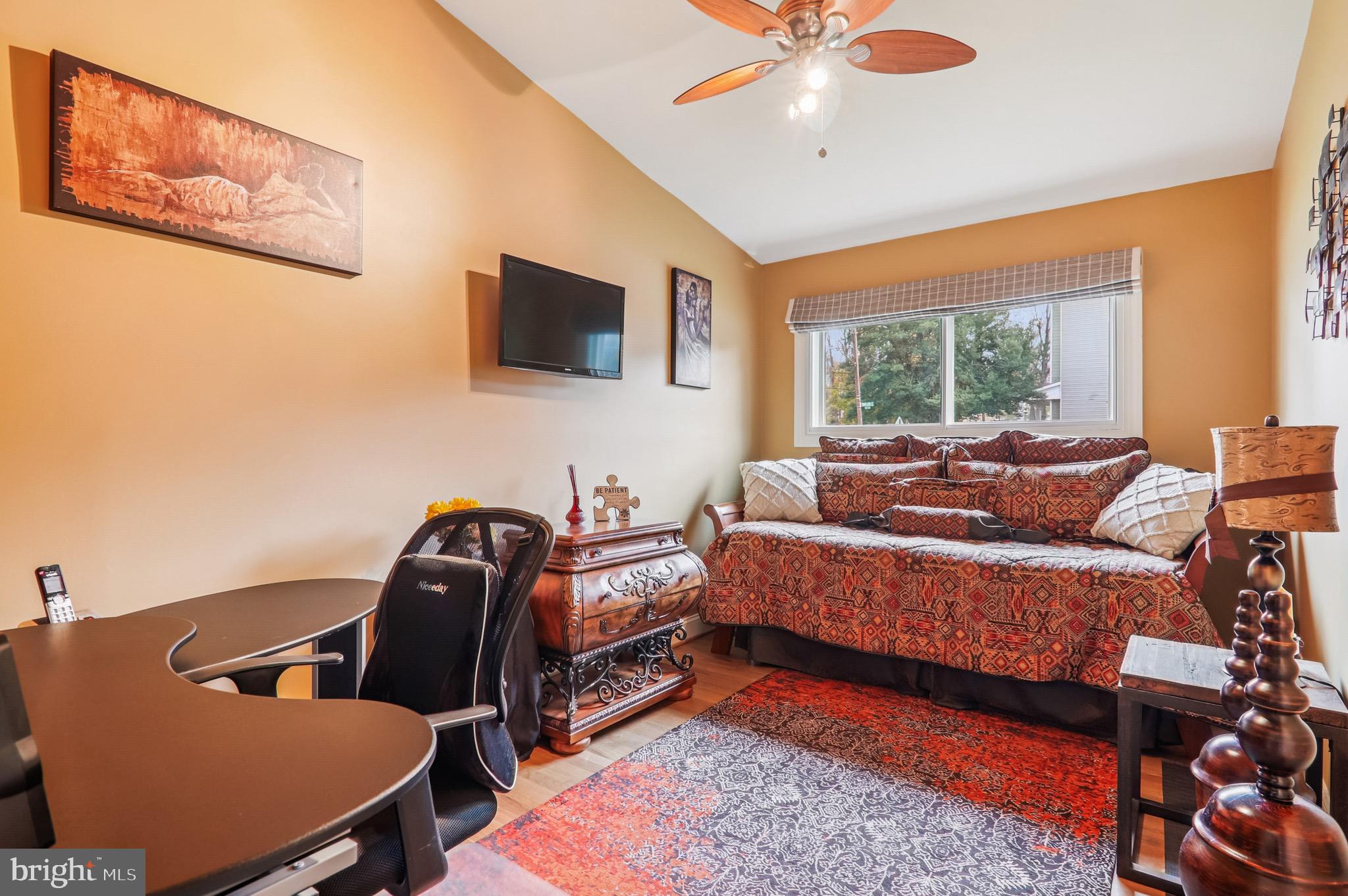 4200 19th Street Northeast Washington, DC 20018 - Photo 15 of 34 a living room with furniture and a flat screen tv
