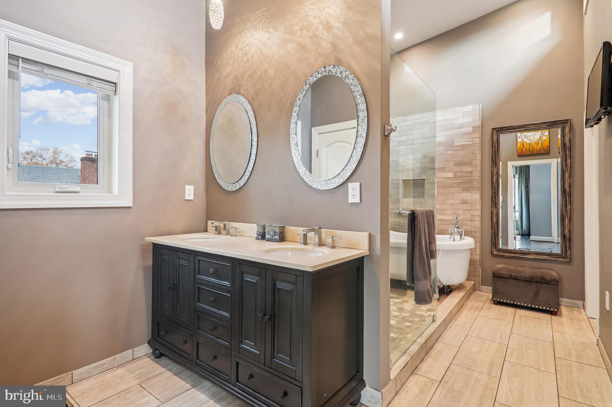 4200 19th Street Northeast Washington, DC 20018 - Photo 24 of 34 a bathroom with a sink and a mirror