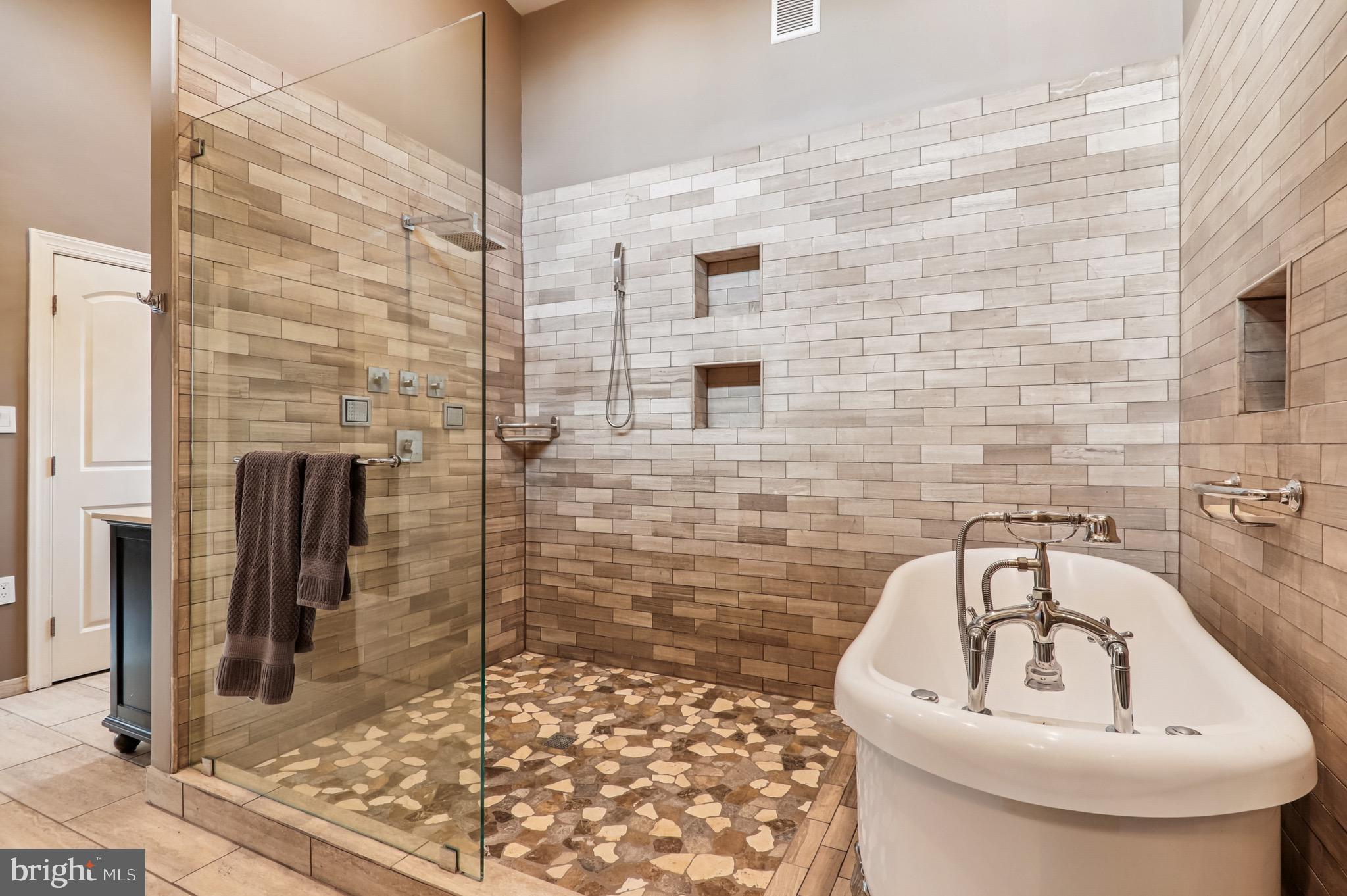 4200 19th Street Northeast Washington, DC 20018 - Photo 25 of 34 a bathroom with a sink a toilet and shower