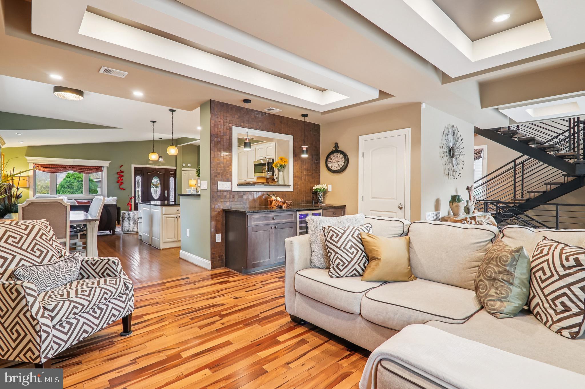 4200 19th Street Northeast Washington, DC 20018 - Photo 10 of 34 a living room with furniture and wooden floor