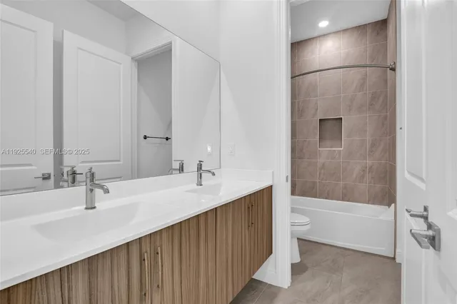 a bathroom with a sink and a bathtub