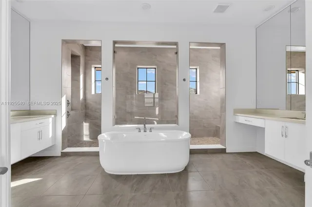 a bathroom with a bathtub and a sink