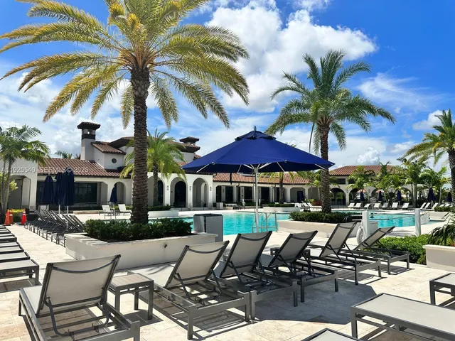a kitchen with lots of counter space and window