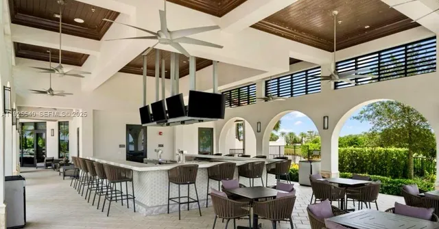 a kids room that has a bed and a table in it