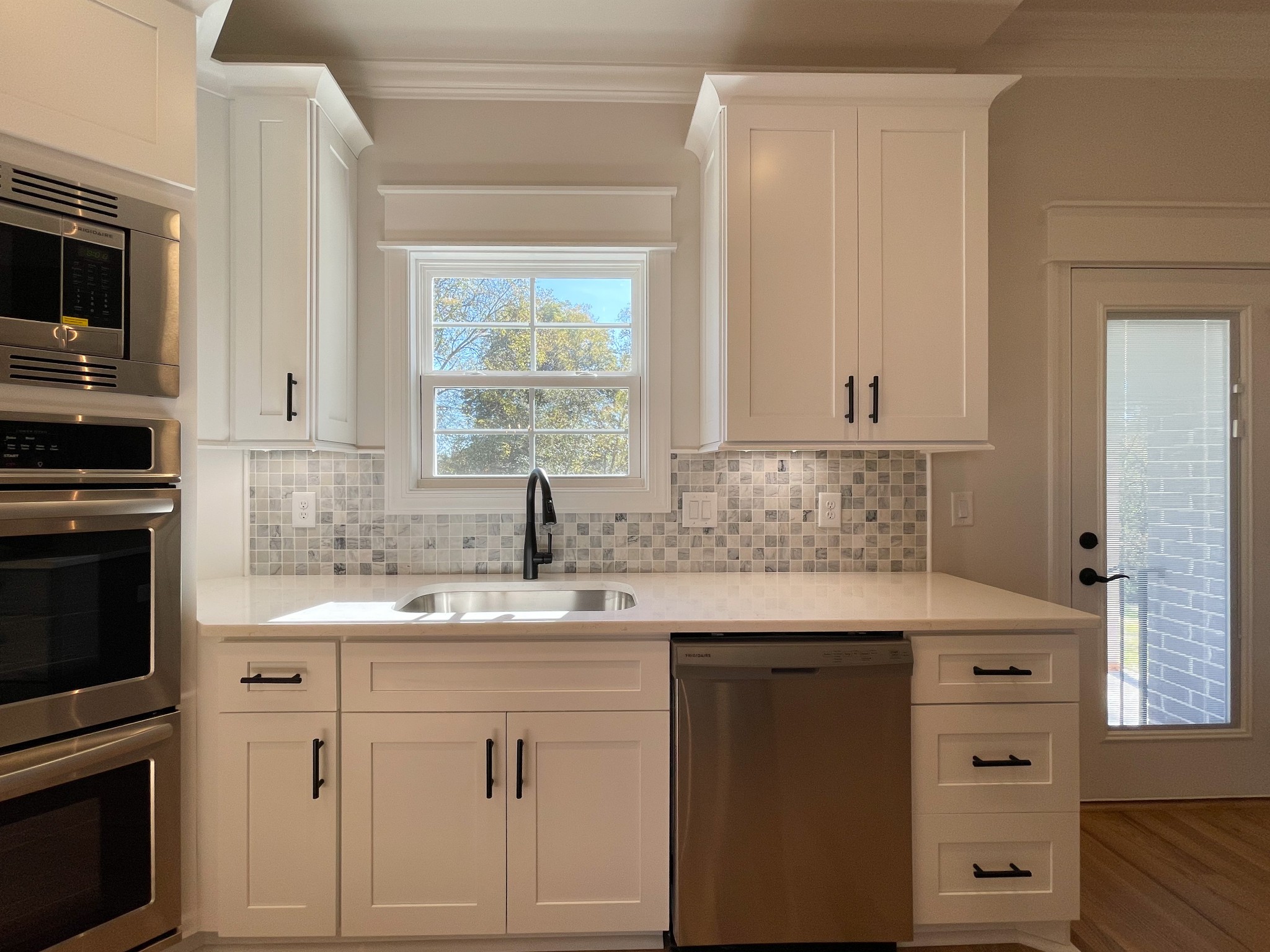 3035 Turnstone Trace Spring Hill, TN 37174 - Photo 12 of 41 a kitchen with granite countertop cabinets stainless steel appliances and a sink