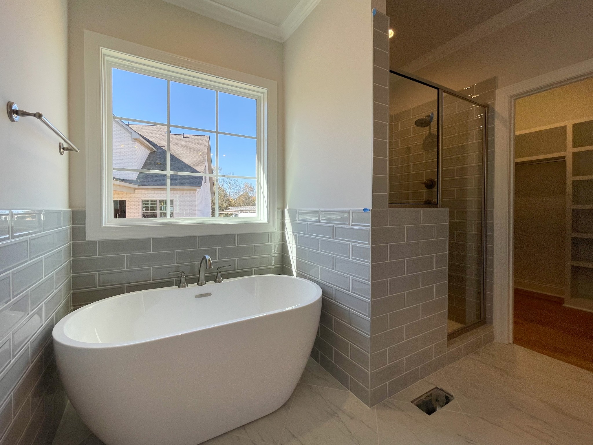 3035 Turnstone Trace Spring Hill, TN 37174 - Photo 18 of 41 a bathroom with a bathtub and shower