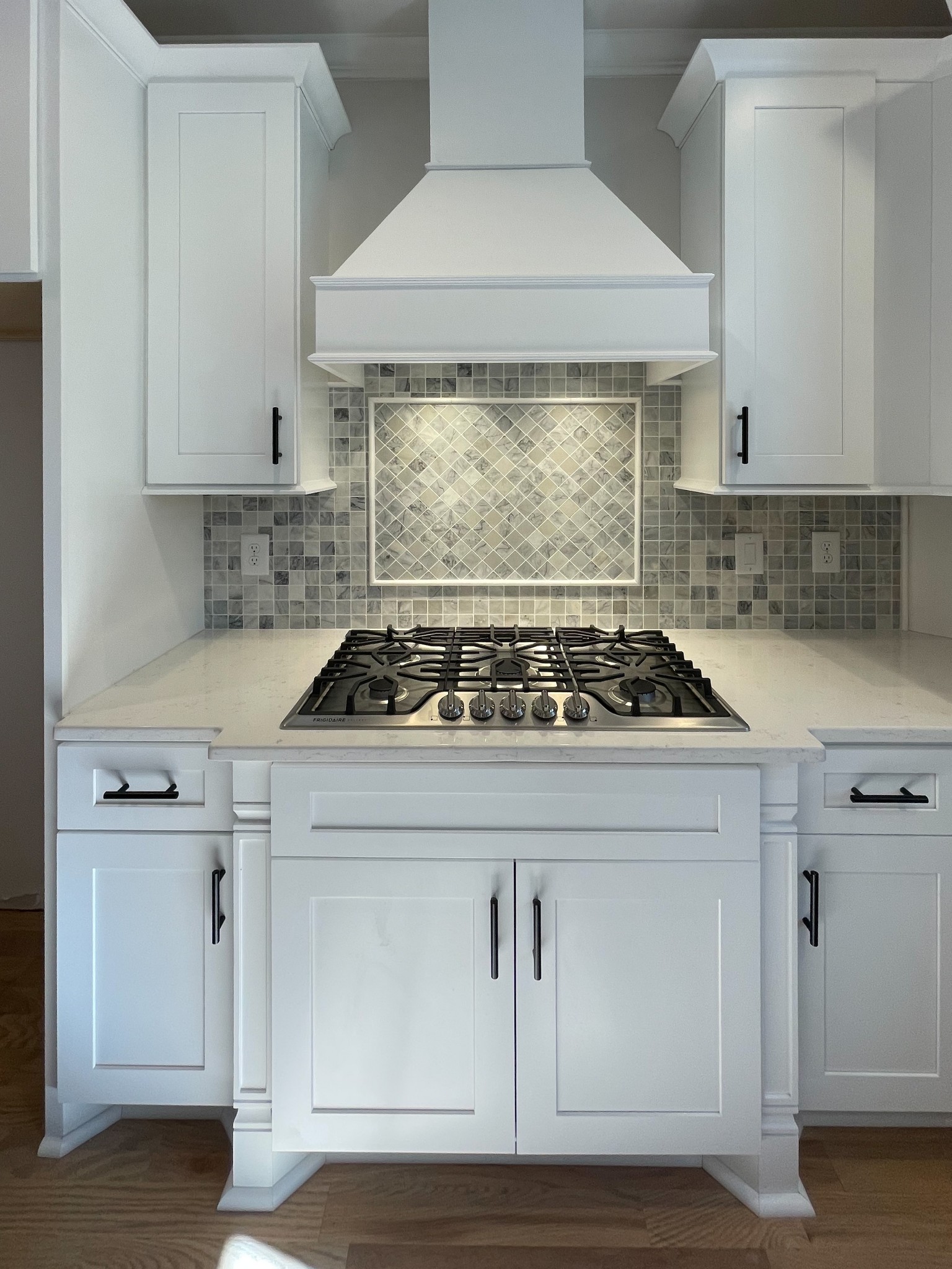 3035 Turnstone Trace Spring Hill, TN 37174 - Photo 9 of 41 a kitchen with granite countertop white cabinets and a stove
