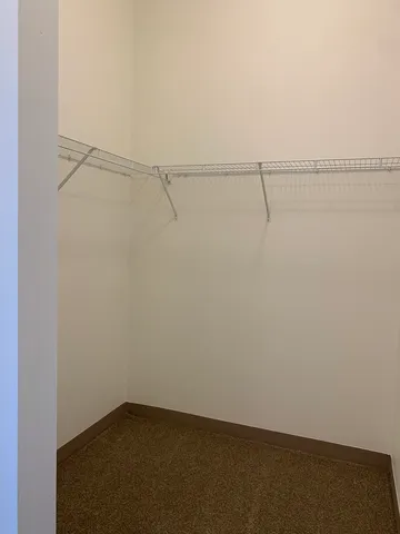 a view of small space with racks on the wall