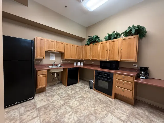 a reading room with furniture and book shelf