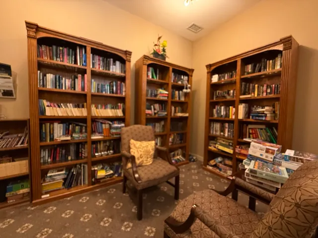 a view of a storage & utility room with two washing machine