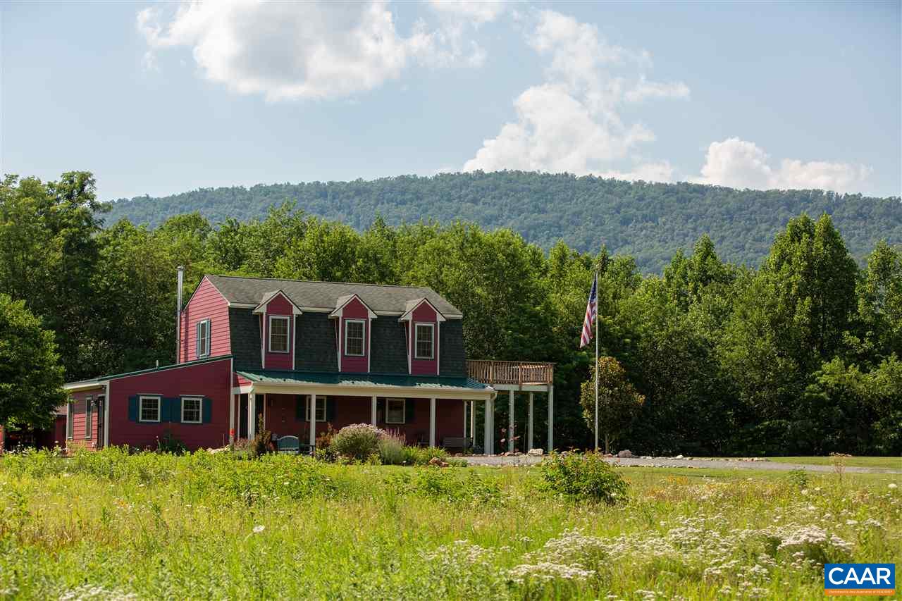 8485 Laurel Road Shipman, VA 22971 - Photo 2 of 23 a view of a house with a yard and sitting area