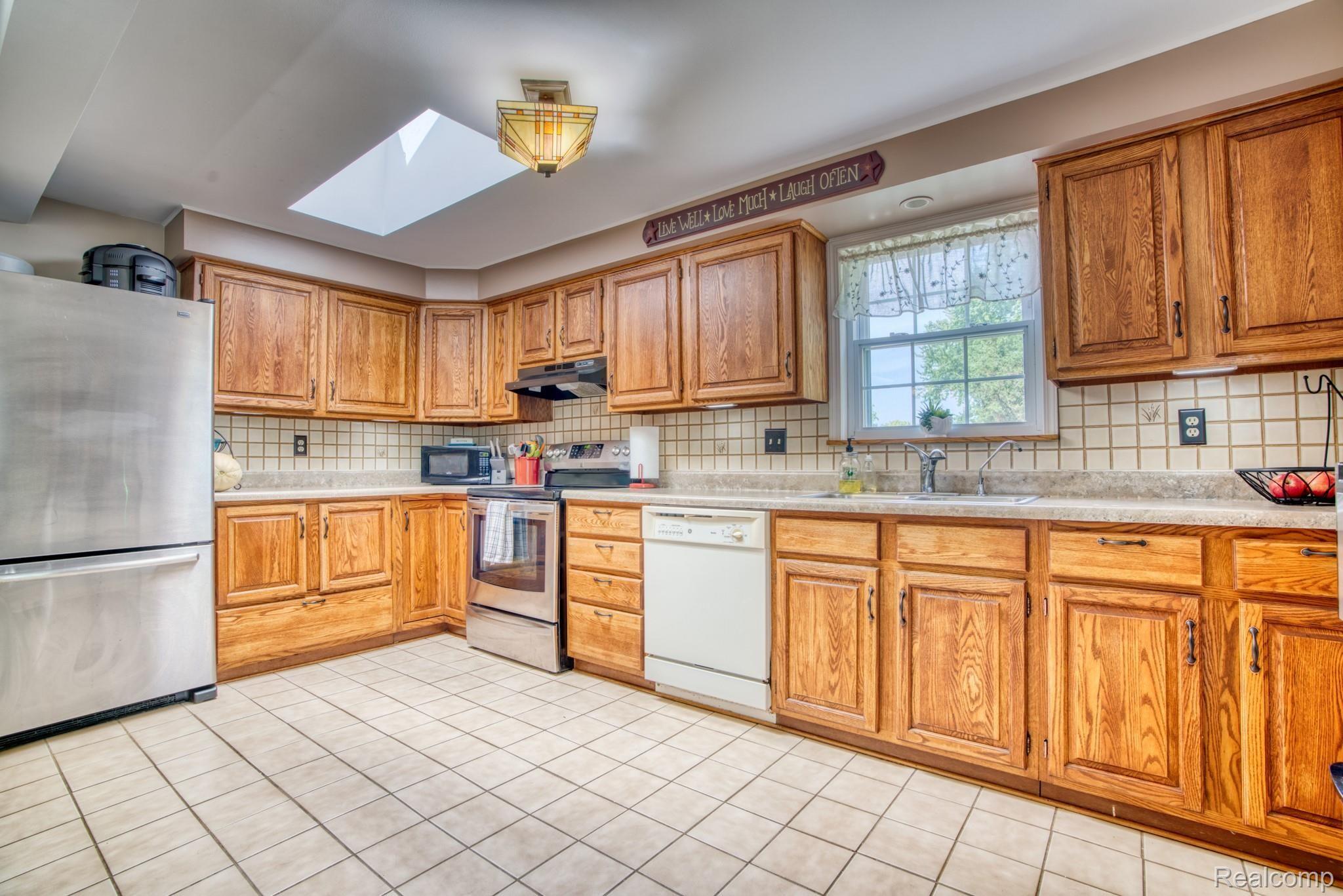 4065 Jewell Road Howell, MI 48843 - Photo 10 of 62 PLENTY OF CABINETS AND COUNTER SPACE