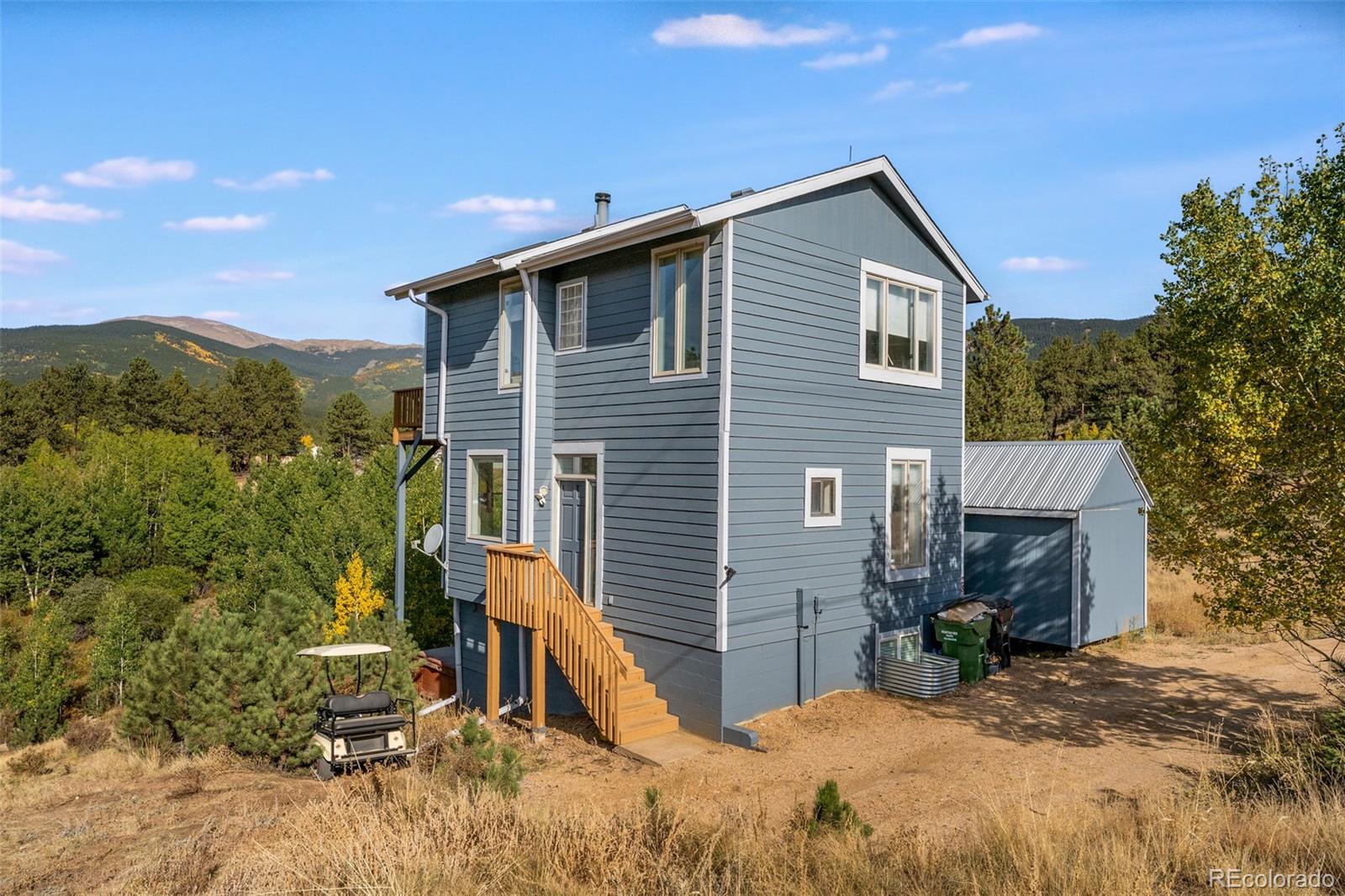 285 Appleby Street Bailey, CO 80421 - Photo 1 of 35 a view of a house with a yard