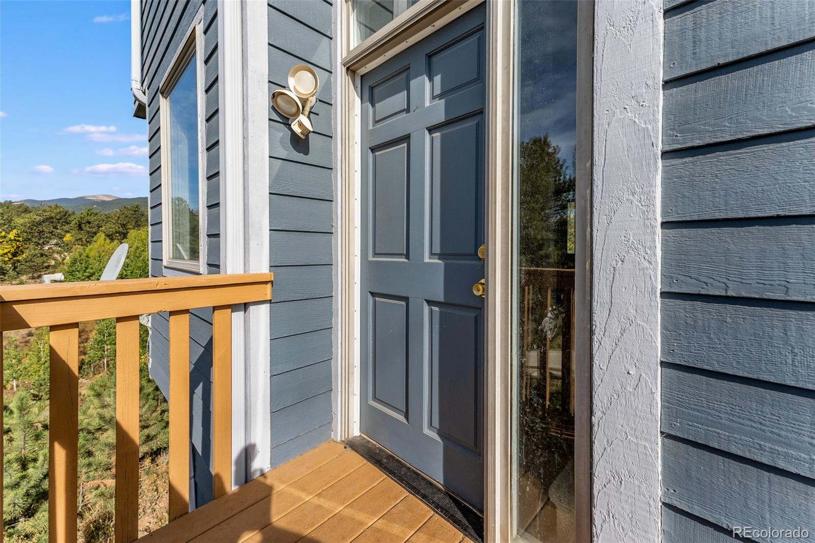 285 Appleby Street Bailey, CO 80421 - Photo 2 of 35 a view of a balcony of a house