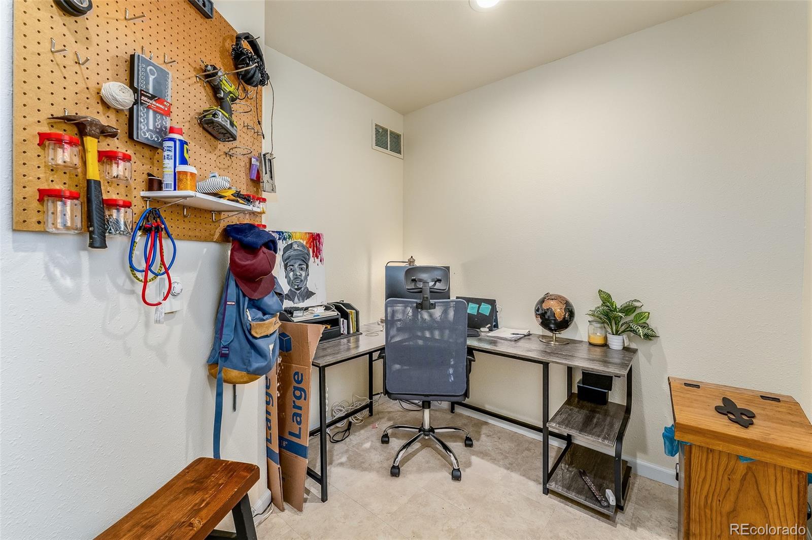 285 Appleby Street Bailey, CO 80421 - Photo 21 of 35 a view of a workspace with furniture and a window