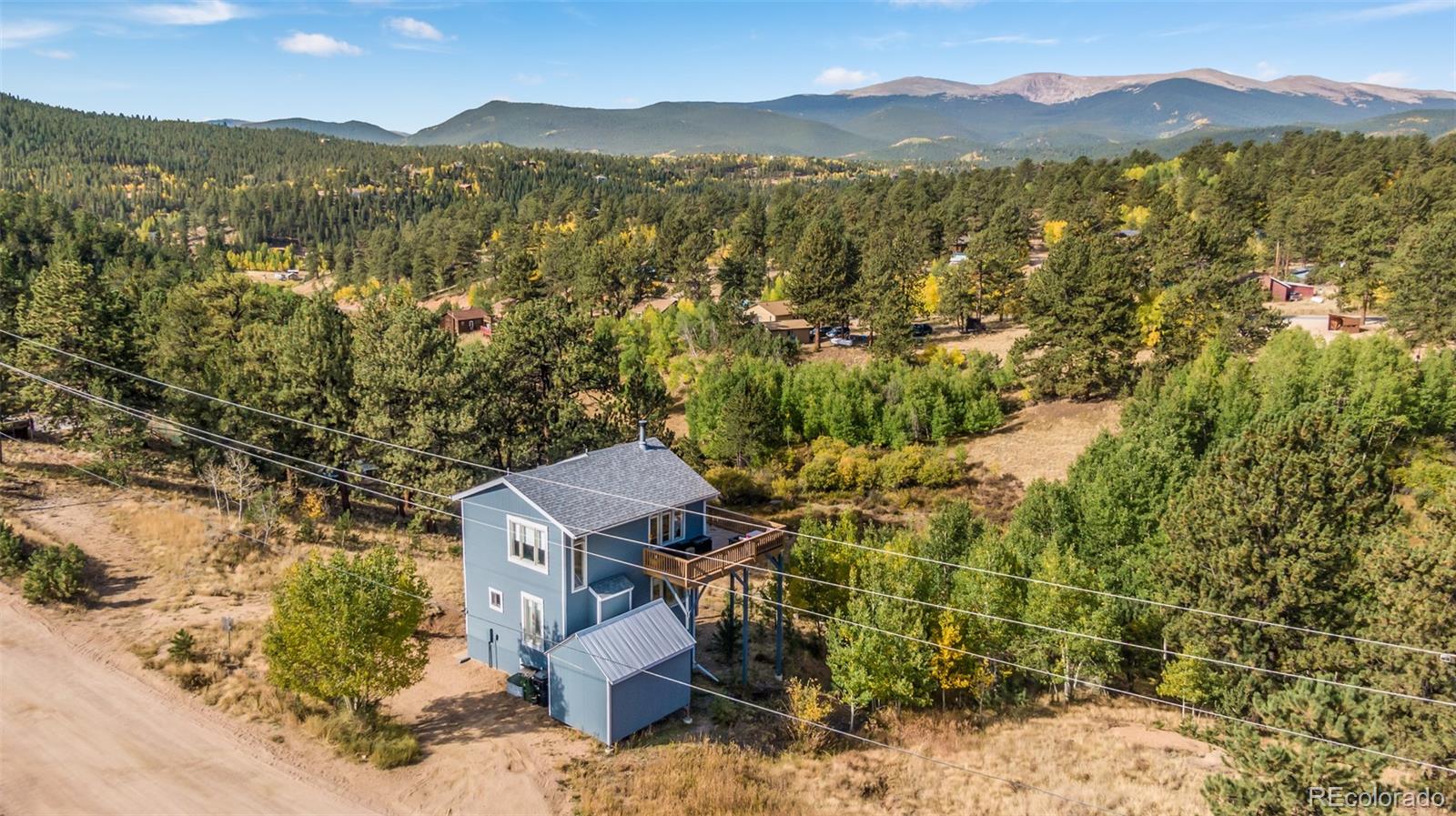 285 Appleby Street Bailey, CO 80421 - Photo 33 of 35 a view of a town with mountains in the background