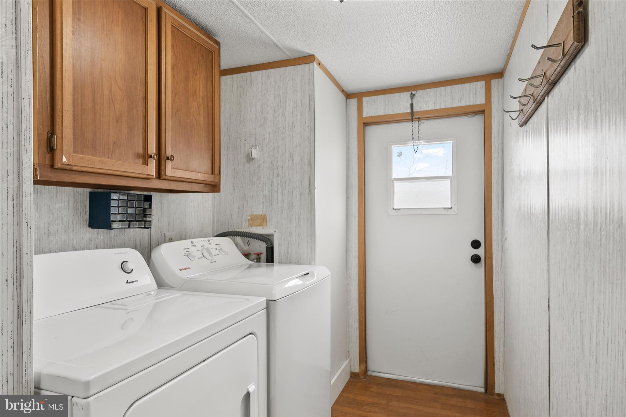 36999 Hudson Road Selbyville, DE 19975 - Photo 23 of 28 a utility room with dryer and washer