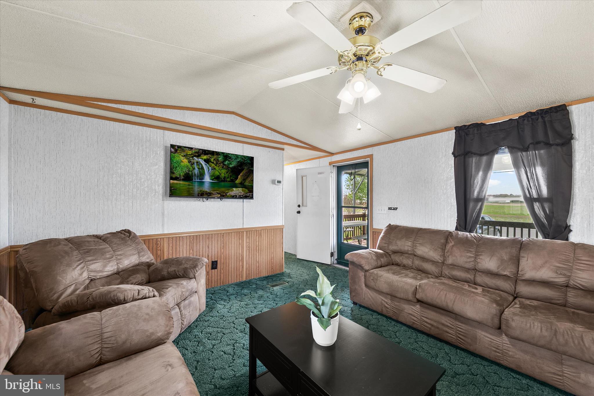 36999 Hudson Road Selbyville, DE 19975 - Photo 5 of 28 a living room with furniture and a large window