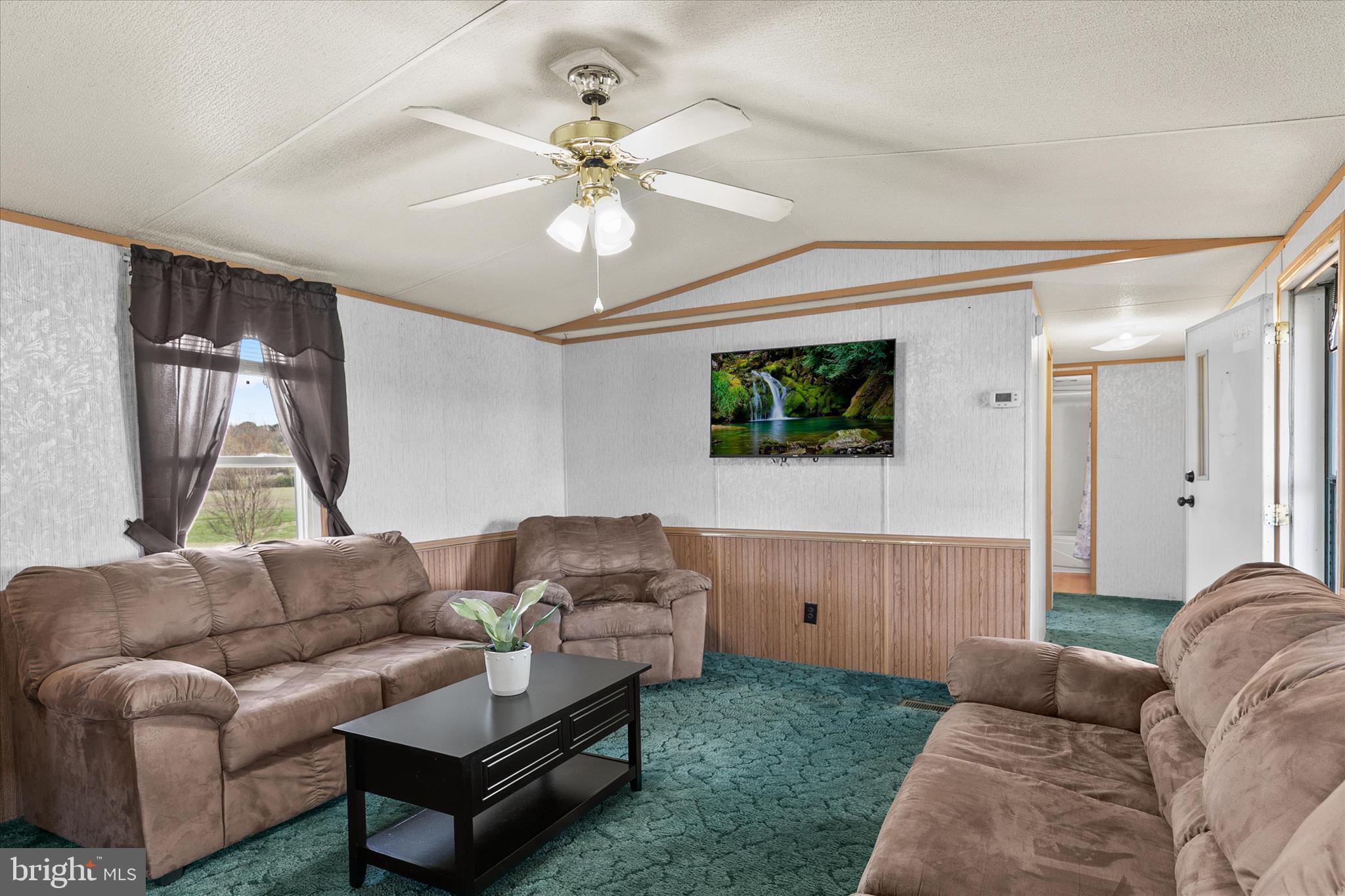36999 Hudson Road Selbyville, DE 19975 - Photo 6 of 28 a living room with furniture and a window