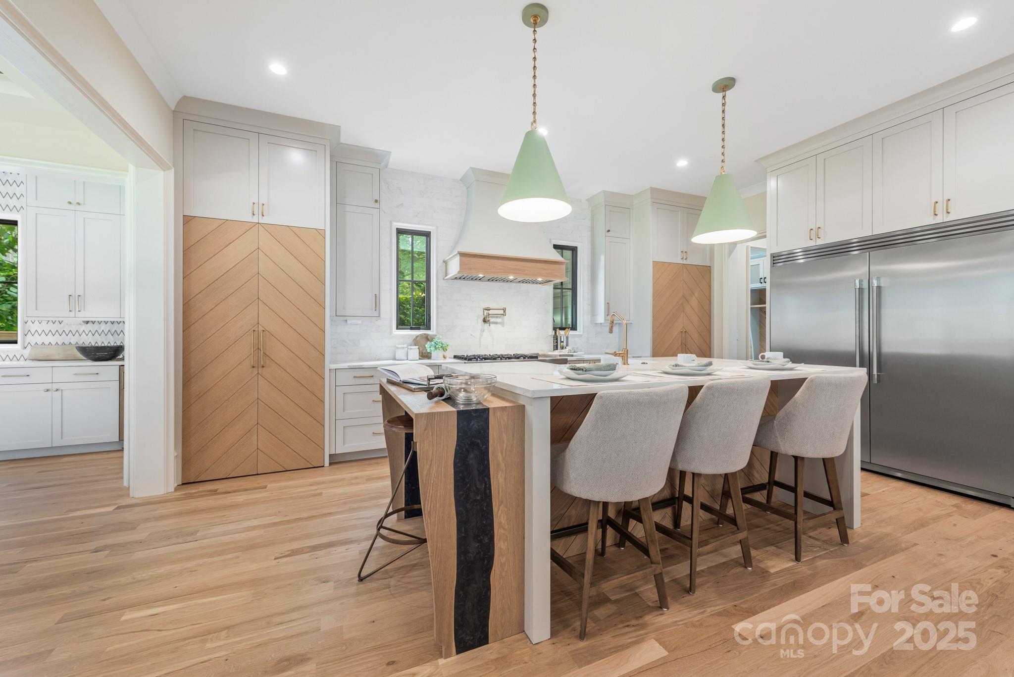 4021 Ridgecrest Avenue Charlotte, NC 28211 - Photo 13 of 47 a view of a dining room with furniture