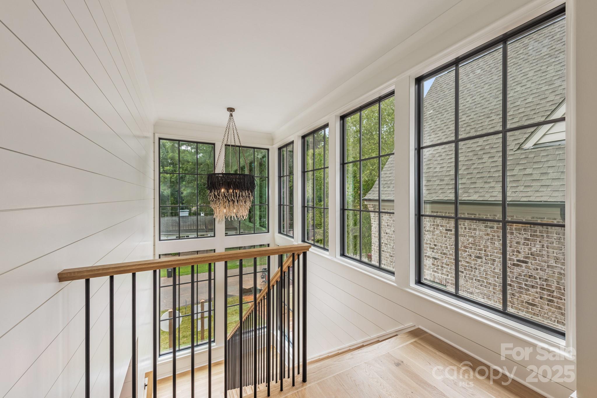 4021 Ridgecrest Avenue Charlotte, NC 28211 - Photo 29 of 47 a view of a room with large windows