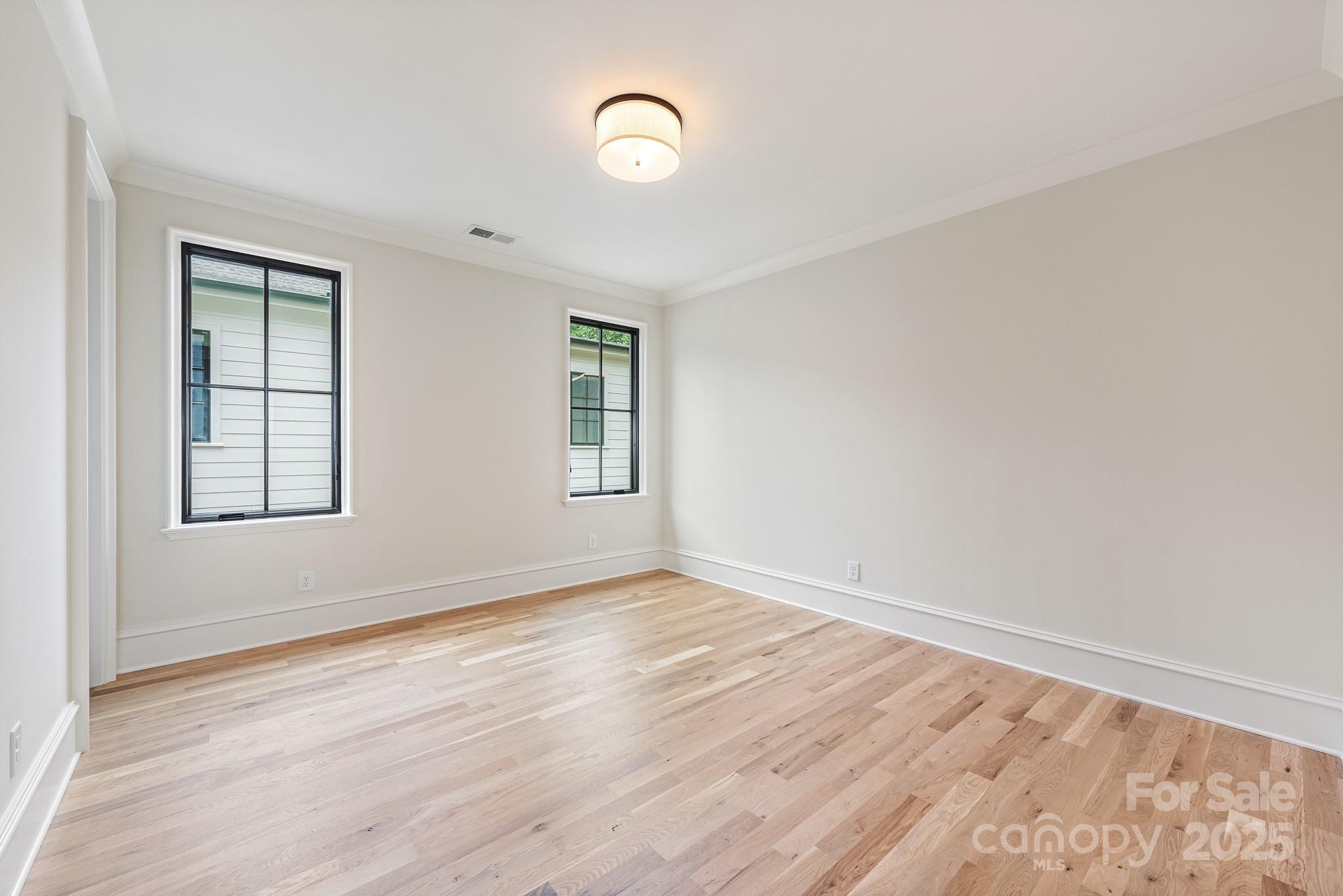 4021 Ridgecrest Avenue Charlotte, NC 28211 - Photo 41 of 47 an empty room with windows