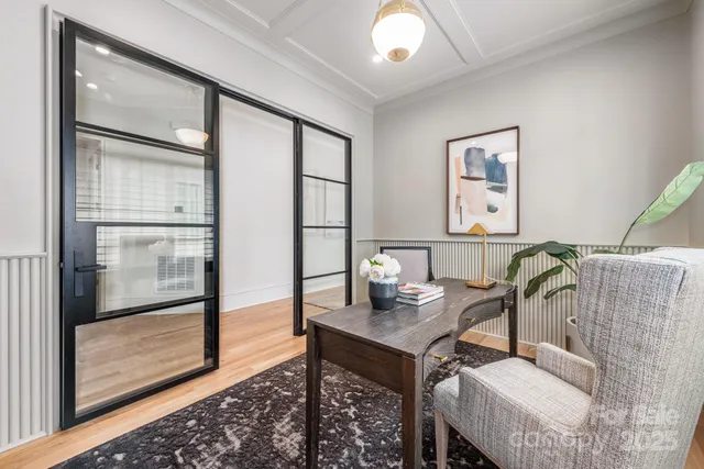 a view of a workspace with furniture