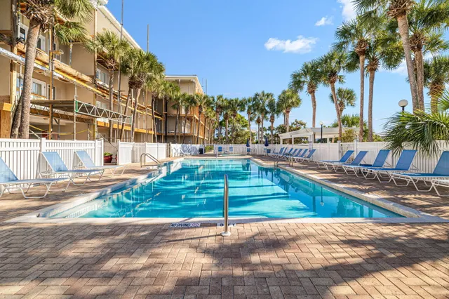 a view of a swimming pool with a lake view