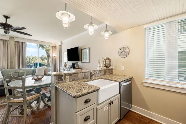 a view of a kitchen area with furniture and a window