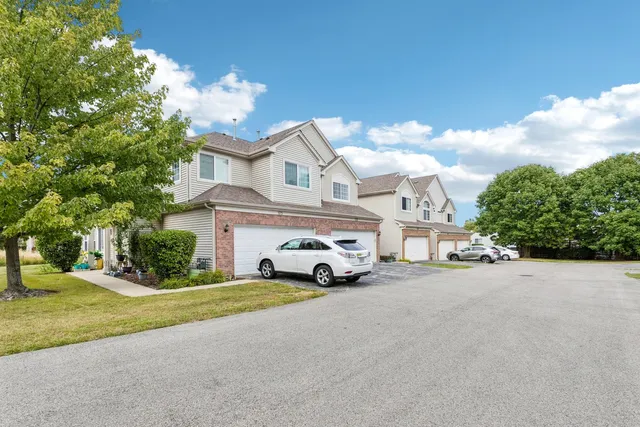 a view of yard with large trees