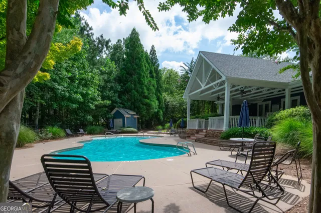 a view of a patio with a yard
