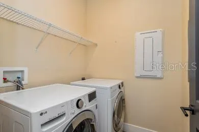 a utility room with dryer and washer