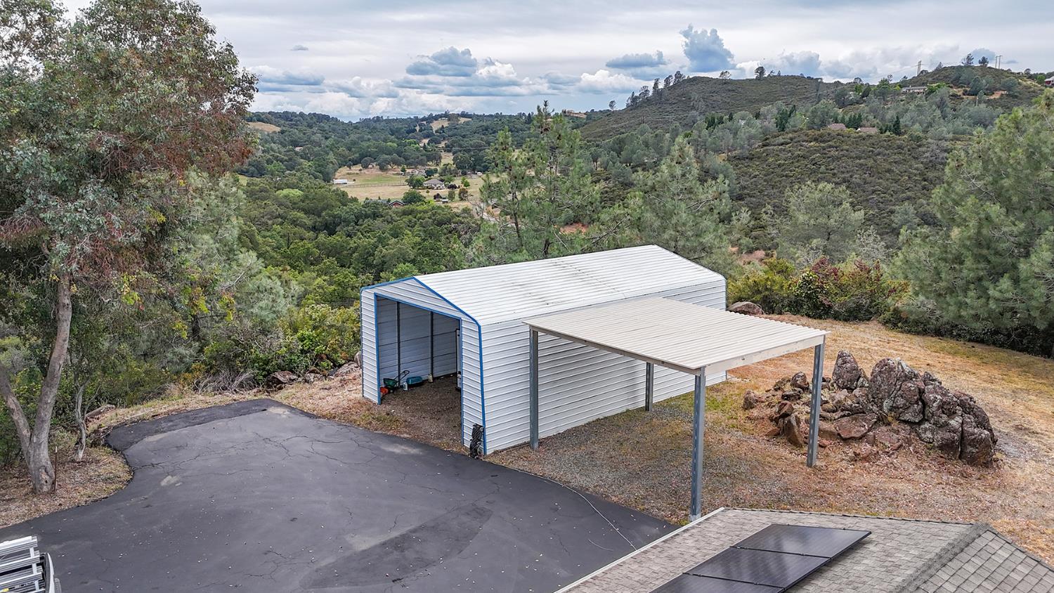 1261 Jurgens Road Rescue, CA 95672 - Photo 41 of 80 rv covered parking and additional covered parking. Also a 3 car garage.