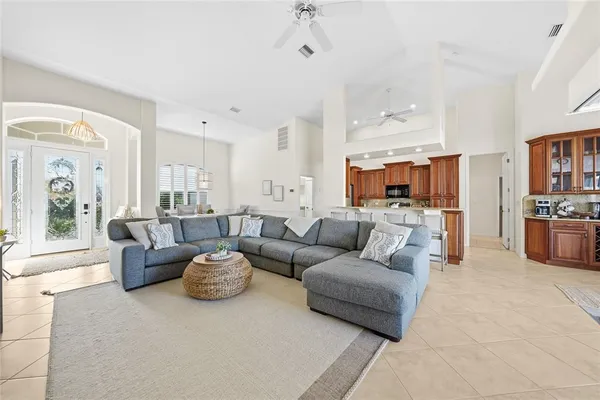 a bedroom with a bed and a chair