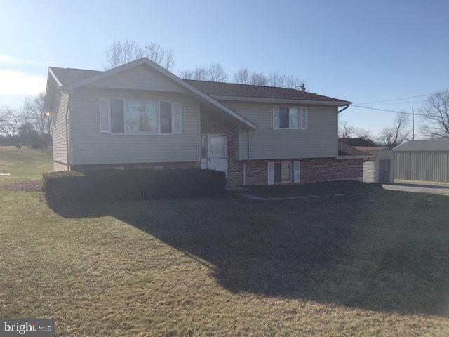 435 St Johns Road Littlestown, PA 17340 - Photo 3 of 25 a front view of a house with a yard